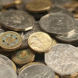 a pile of gold and silver Australian coins